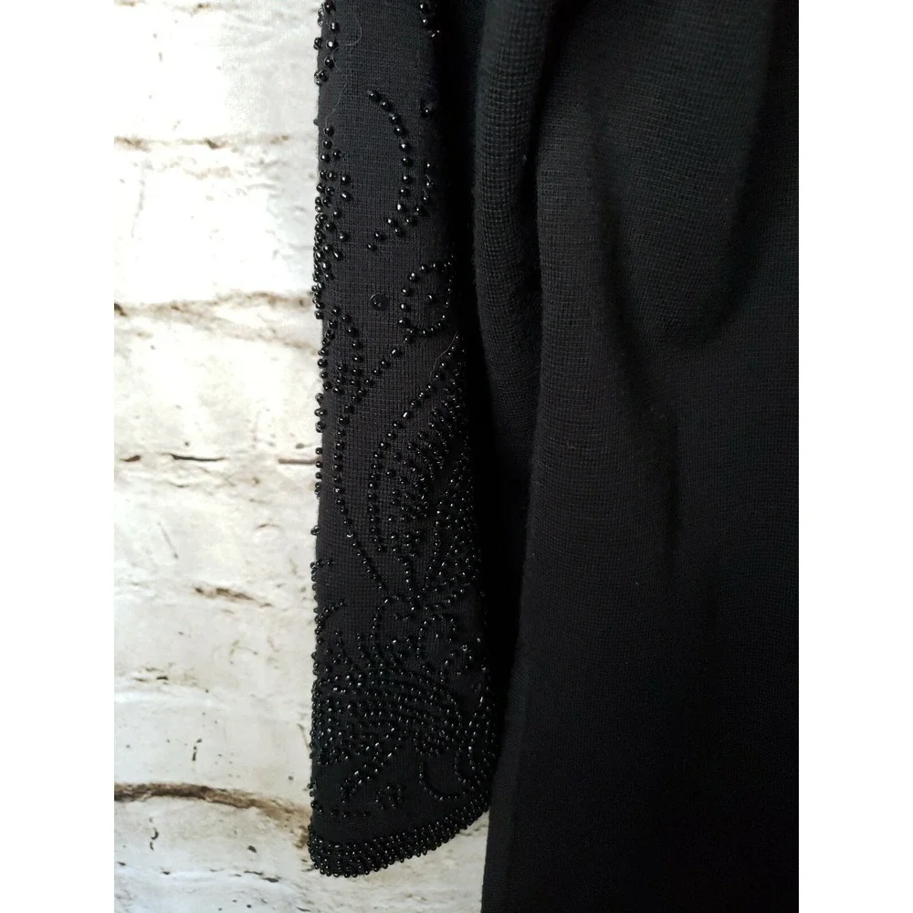 Woman's Theomiles  Black sweater with beaded sleeves sz M
